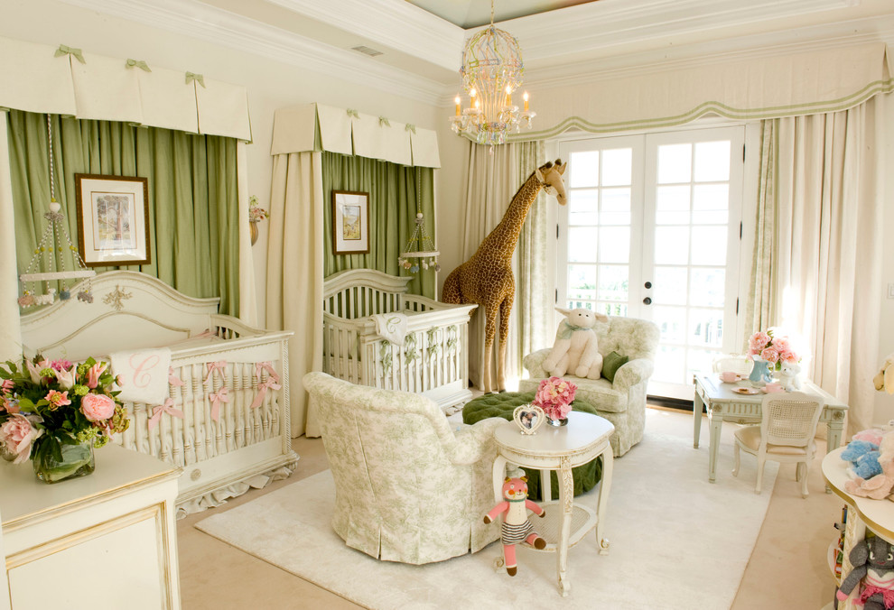 This is an example of a large traditional nursery for girls in Los Angeles with beige walls and carpet.