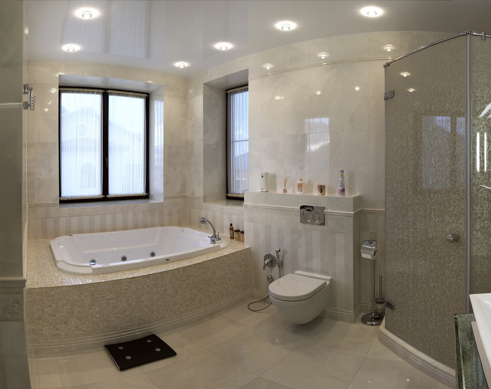 Immagine di una grande stanza da bagno padronale con vasca idromassaggio, doccia ad angolo, WC sospeso, piastrelle beige, piastrelle in ceramica, pareti beige, pavimento in gres porcellanato e top in vetro riciclato
