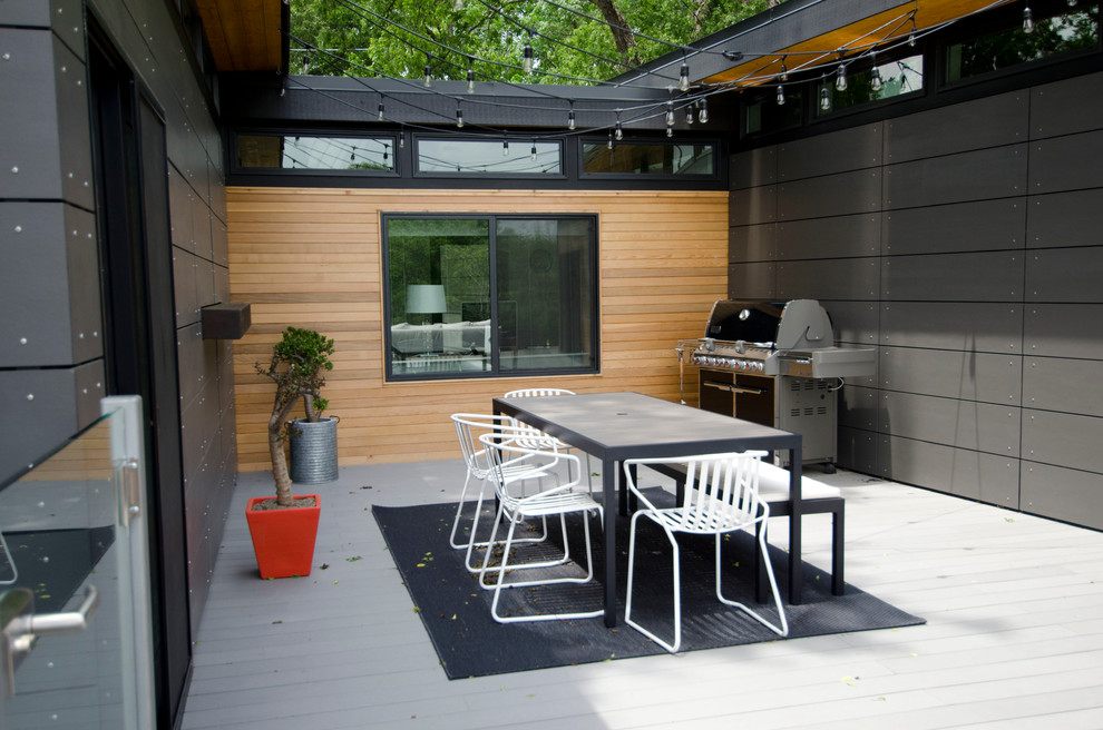 This is an example of a contemporary deck in Dallas with no cover.