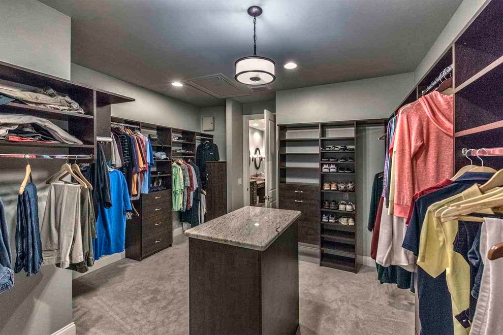 Example of a transitional closet design in Miami