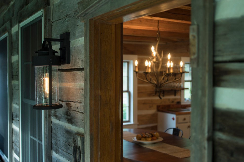 Example of a mountain style dining room design in Chicago