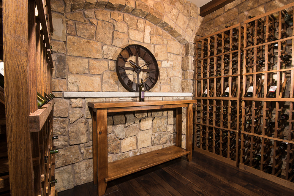 Mid-sized country wine cellar in Minneapolis with medium hardwood floors and storage racks.