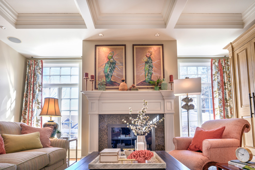 This is an example of a mid-sized traditional open concept living room in New York with medium hardwood floors, a standard fireplace, a wood fireplace surround, a concealed tv, coffered and beige walls.
