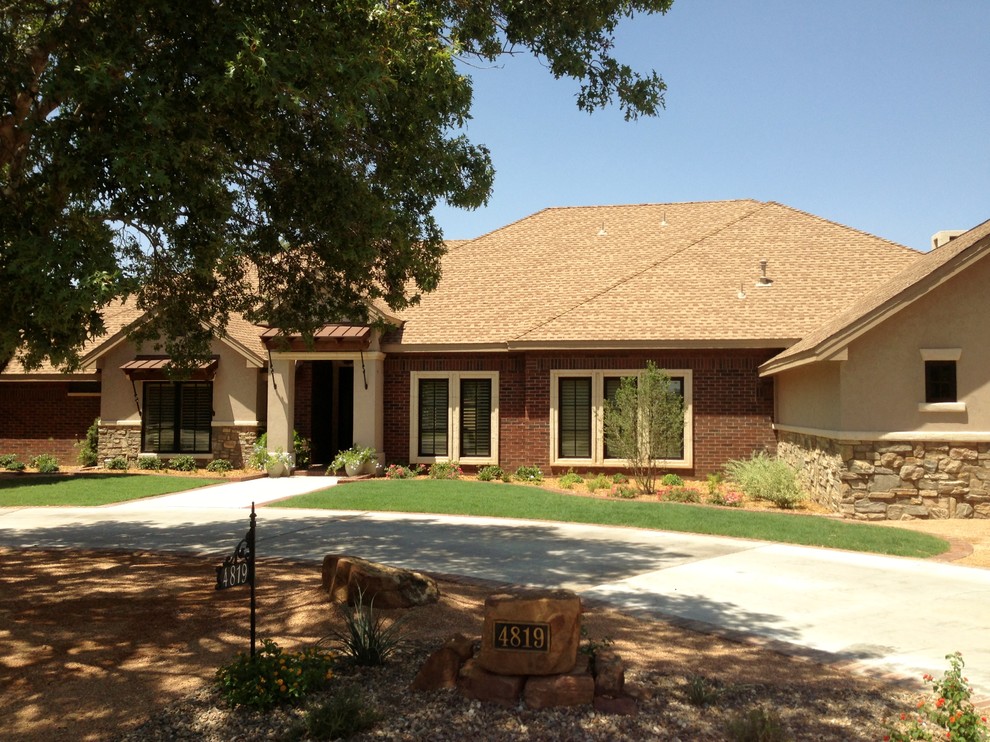 Inspiration for a mid-sized rustic one-story mixed siding beige home design remodel in Austin
