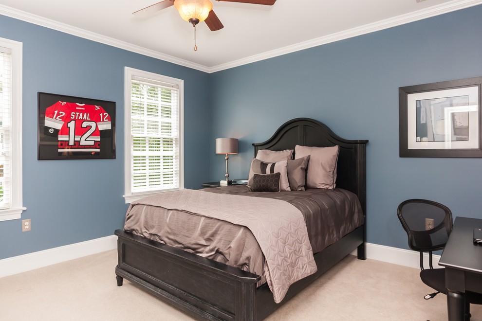 Photo of a modern bedroom in Raleigh.