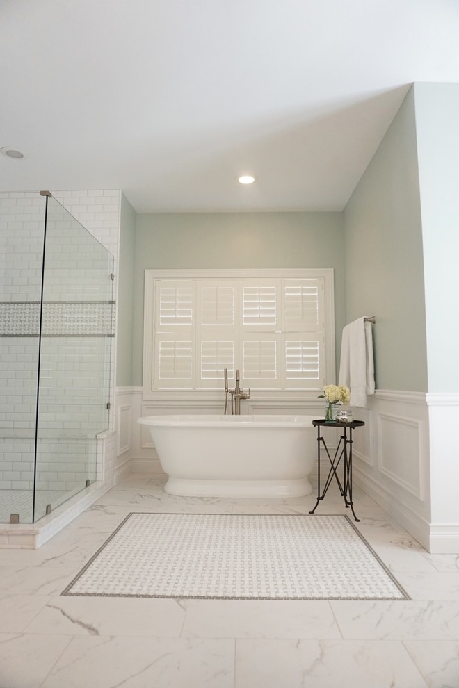 Design ideas for a large traditional master bathroom in St Louis with an undermount sink, beaded inset cabinets, dark wood cabinets, quartzite benchtops, a freestanding tub, a corner shower, white tile, subway tile, green walls and porcelain floors.