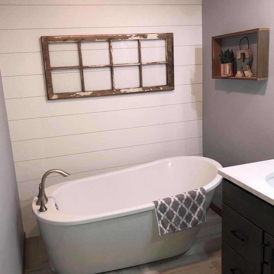 Mid-sized transitional master gray tile and porcelain tile porcelain tile and beige floor freestanding bathtub photo with shaker cabinets, dark wood cabinets, gray walls, an undermount sink, quartzite countertops and white countertops