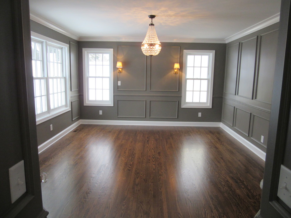 Photo of a traditional bedroom in Minneapolis with grey walls, dark hardwood floors and no fireplace.