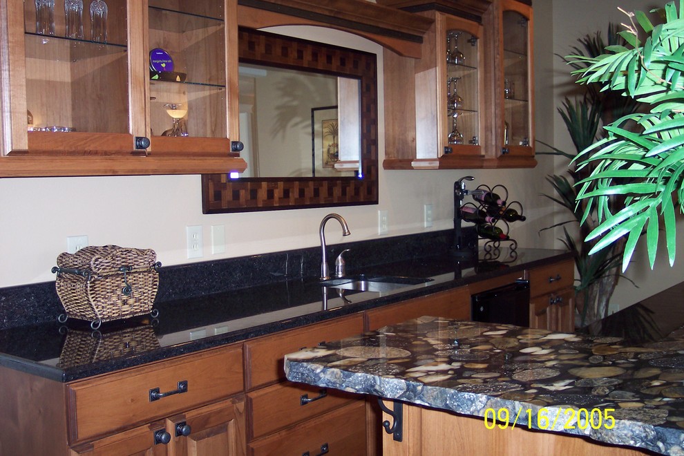 Eclectic kitchen photo with granite countertops