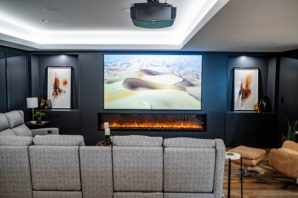 Inspiration for a large modern look-out basement in Other with a home cinema, black walls and vinyl flooring.