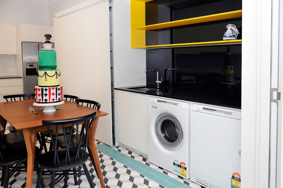 Design ideas for a transitional laundry room in Melbourne.