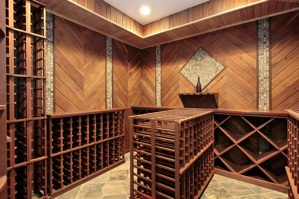 Photo of a mid-sized transitional wine cellar in New York with ceramic floors, display racks and pink floor.