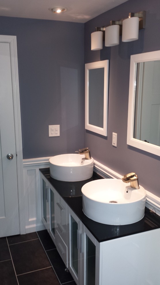 Inspiration for a mid-sized contemporary master bathroom in Detroit with glass-front cabinets, white cabinets, glass benchtops, an alcove tub, a shower/bathtub combo, white tile, subway tile, grey walls and ceramic floors.