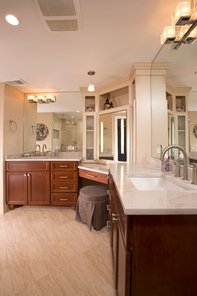 Traditional master bathroom in DC Metro with an undermount sink, recessed-panel cabinets, medium wood cabinets, an alcove shower, beige tile, stone tile, beige walls, quartzite benchtops, a one-piece toilet and ceramic floors.
