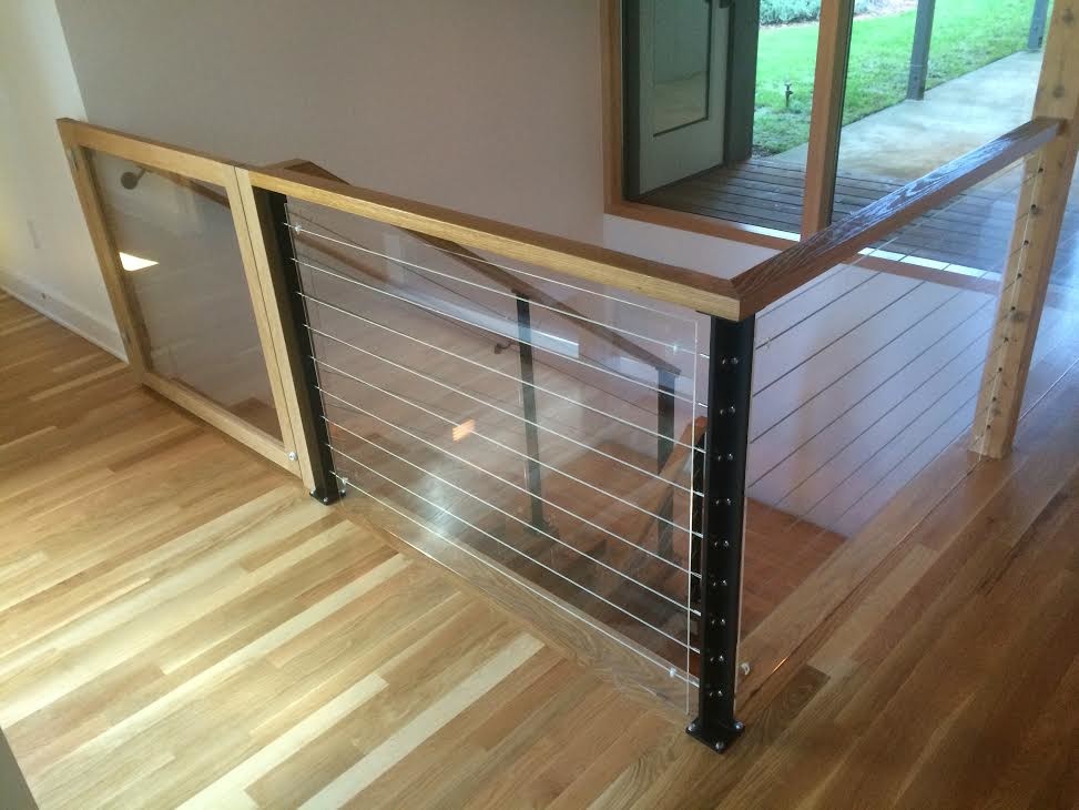 This is an example of a large contemporary staircase in Portland.