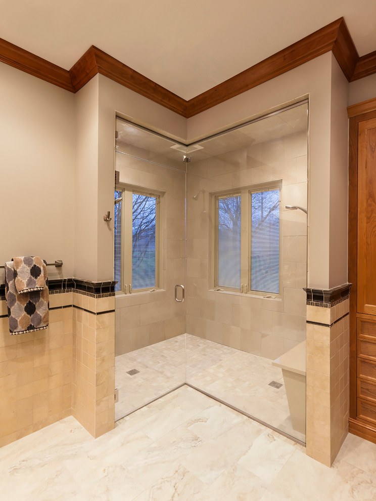 Example of a large transitional master beige tile and stone tile bathroom design in Cleveland with shaker cabinets, light wood cabinets and quartz countertops