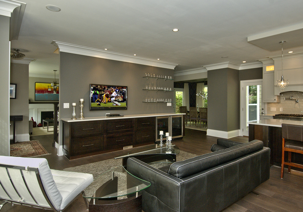 Example of a mid-sized transitional l-shaped dark wood floor open concept kitchen design in DC Metro with an undermount sink, shaker cabinets, white cabinets, quartz countertops, beige backsplash, porcelain backsplash, stainless steel appliances and an island