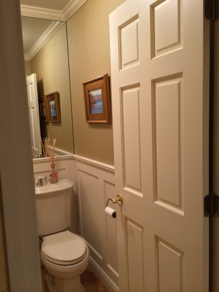 Design ideas for a small traditional powder room in Other.