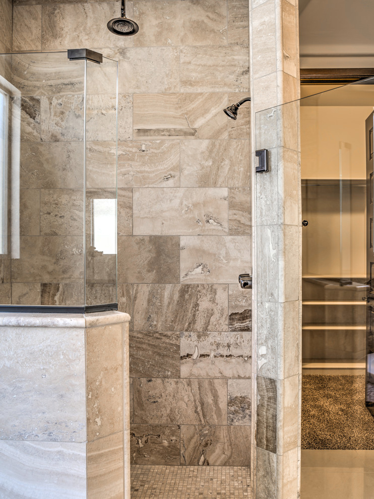 Mid-sized transitional master drop-in bathtub photo in Austin with raised-panel cabinets, dark wood cabinets, beige walls, an undermount sink and granite countertops