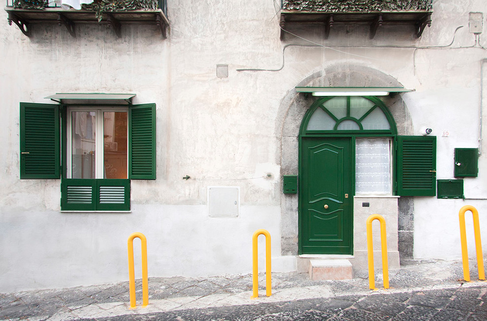 This is an example of a small scandinavian one-storey apartment exterior in Naples.