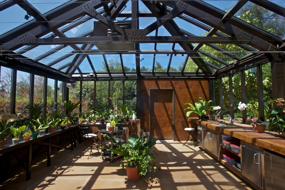 Photo of an expansive traditional detached greenhouse in Vancouver.