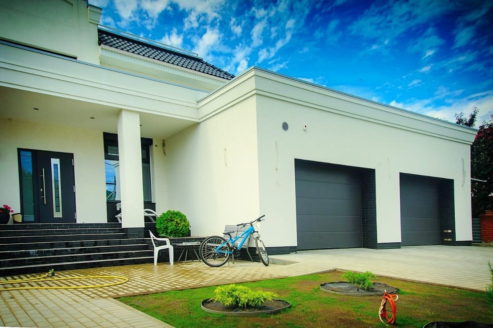 Секционные гаражные ворота и входные двери