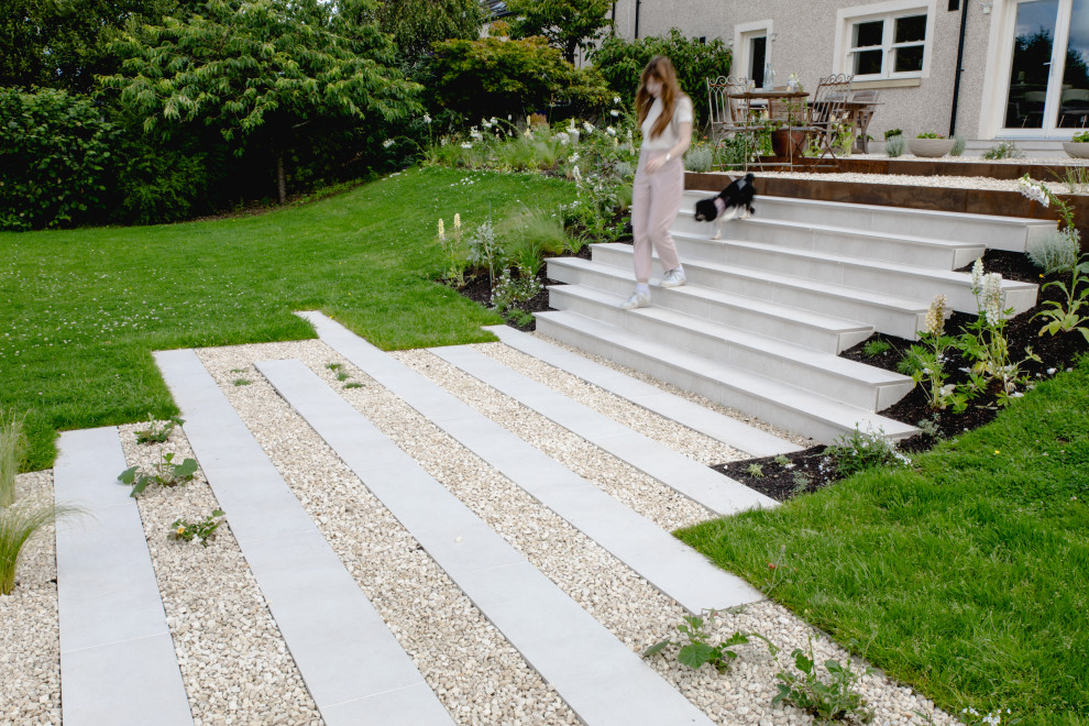 Medium sized contemporary back full sun garden for summer in Glasgow.