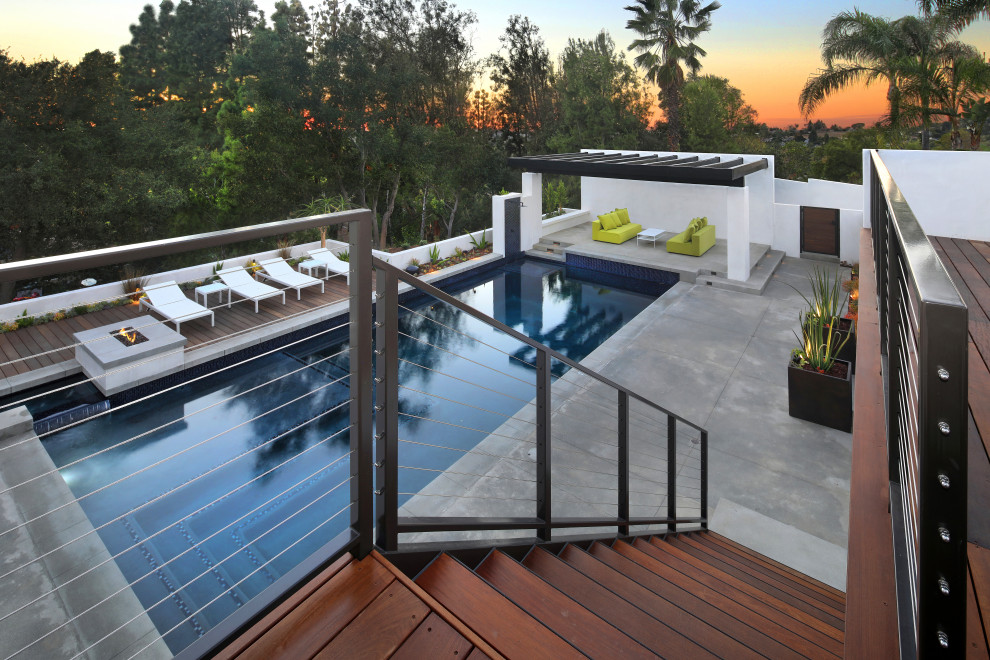 Inspiration for a contemporary pool remodel in Orange County