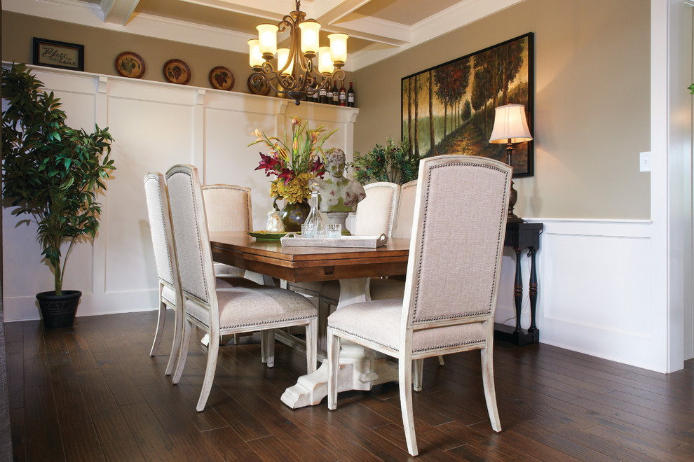 Example of a mid-sized transitional dark wood floor enclosed dining room design with beige walls