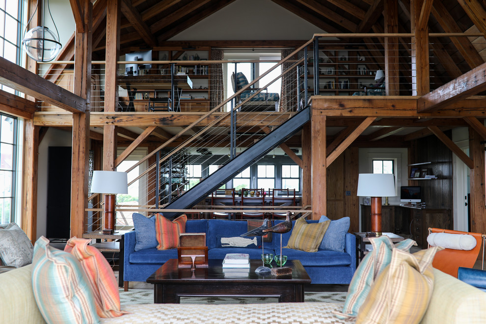 Inspiration for a mid-sized farmhouse open concept living room remodel in Providence with white walls and no tv