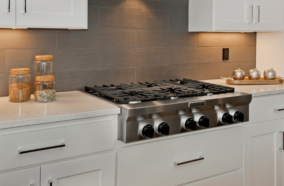 Example of a transitional kitchen design in Boise