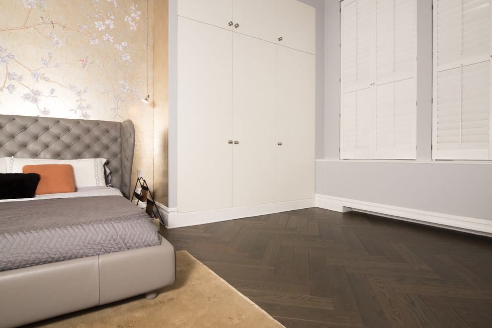 Mid-sized asian master bedroom in New York with dark hardwood floors.