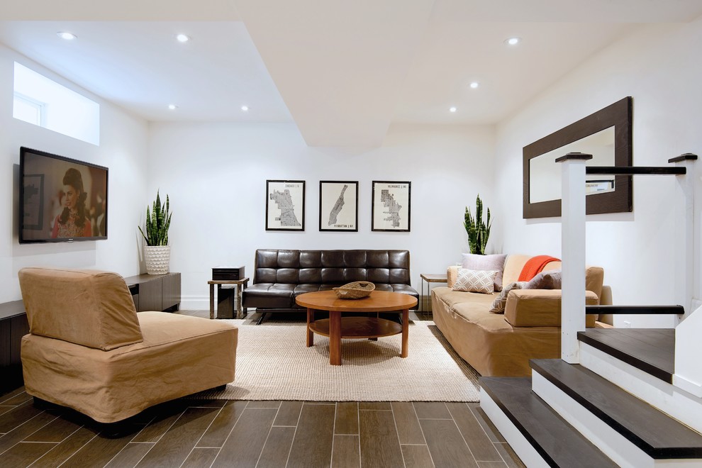 This is an example of a contemporary living room in Toronto with white walls.