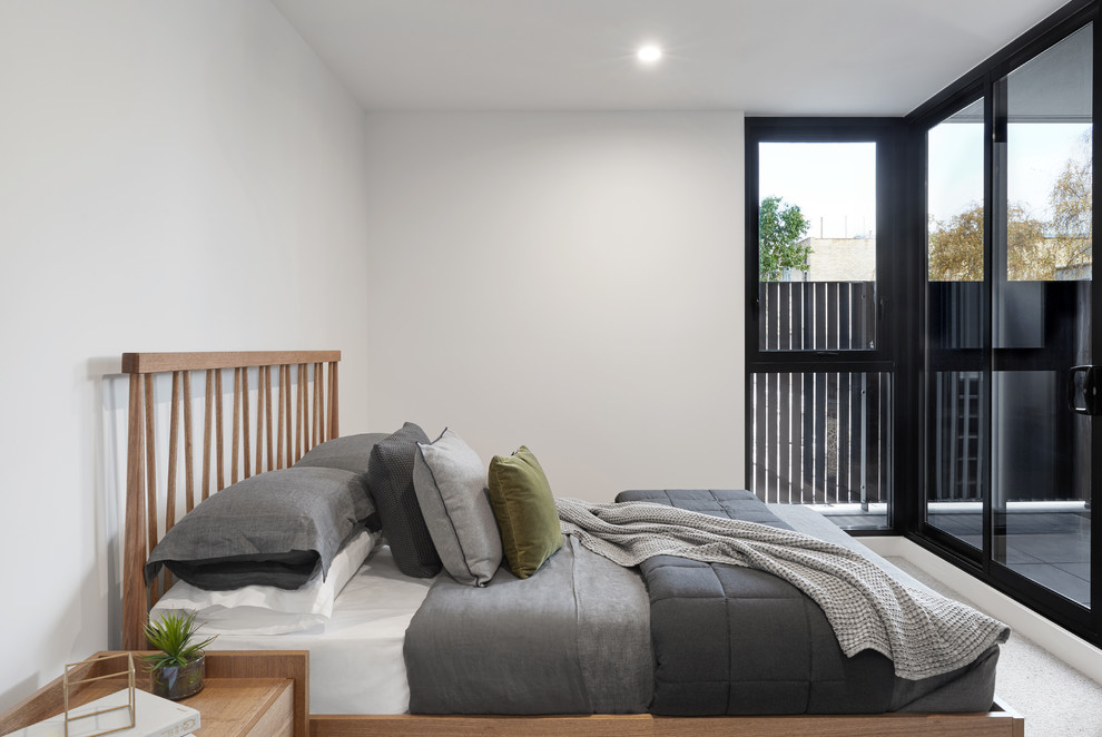 Inspiration for a contemporary guest bedroom in Melbourne with white walls and white floor.
