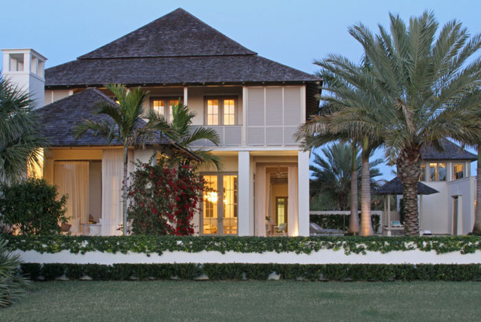 Photo of a tropical home design in Miami.