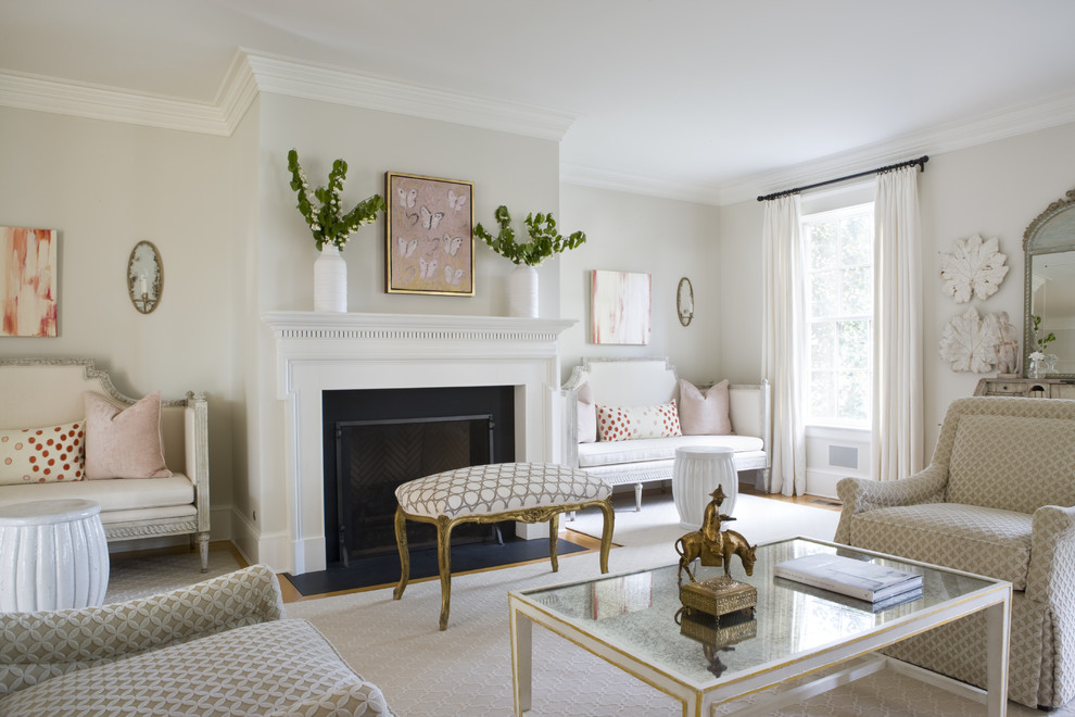 This is an example of a traditional enclosed living room in DC Metro with white walls.