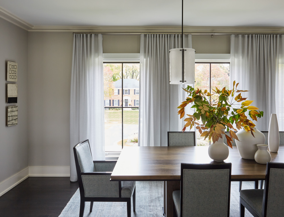 Photo of a large classic dining room in Chicago with grey walls, dark hardwood flooring and brown floors.