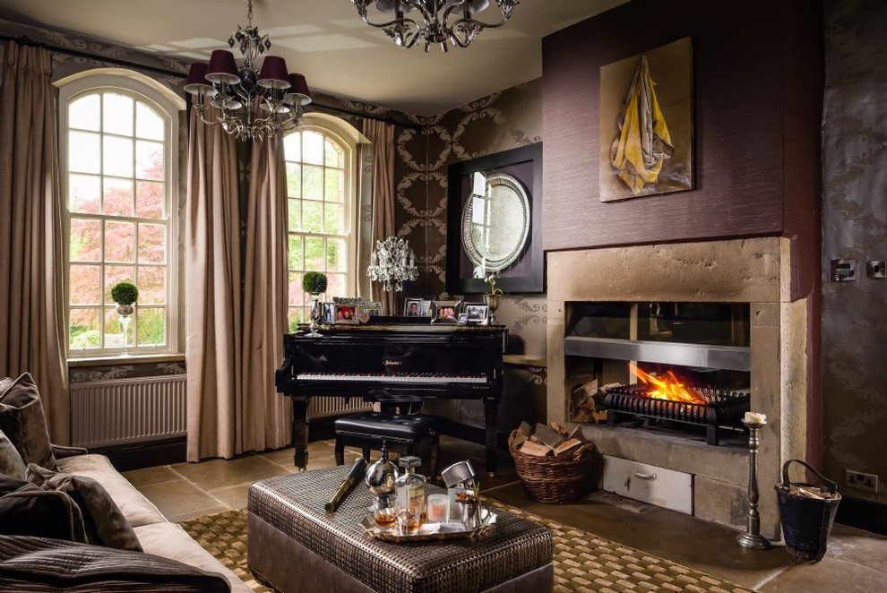 Photo of a medium sized traditional enclosed living room with a music area, multi-coloured walls, limestone flooring, a standard fireplace, a stone fireplace surround and beige floors.