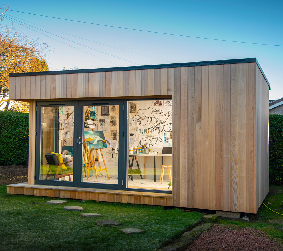 Photo of a mid-sized contemporary detached studio in Other.