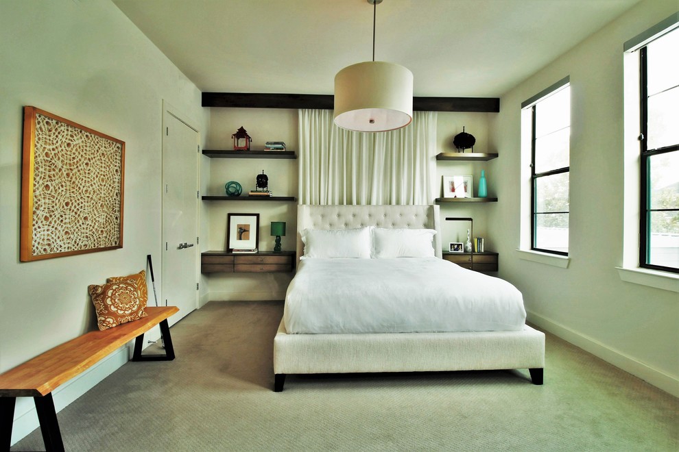 Mid-sized contemporary master bedroom in Los Angeles with white walls, carpet, no fireplace and beige floor.