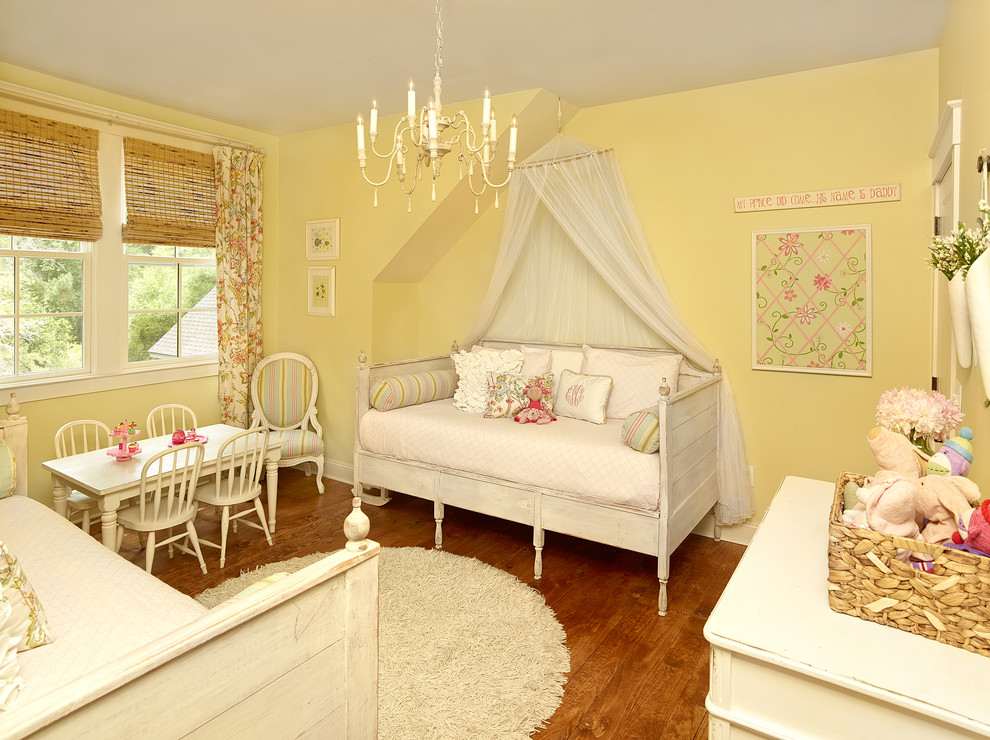 Design ideas for a large beach style kids' room in Charleston with white walls and medium hardwood floors.