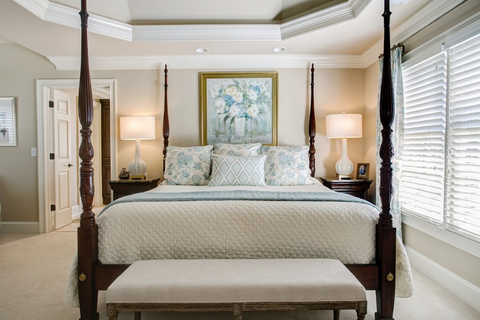 Bedroom - mid-sized traditional master carpeted bedroom idea in Atlanta with beige walls