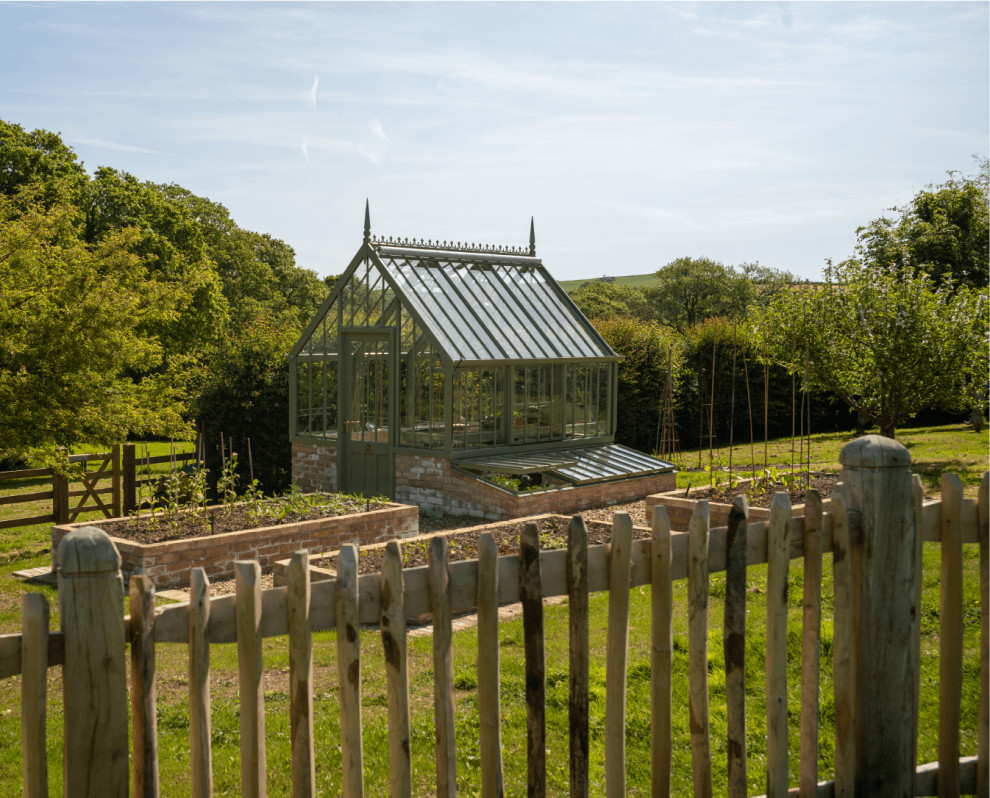 Example of a small ornate detached greenhouse design in Cornwall