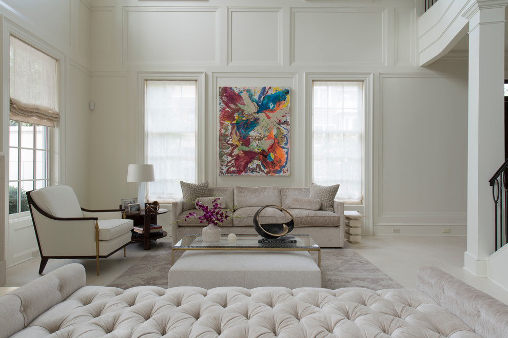 This is an example of a large traditional formal open concept living room in DC Metro with white walls and limestone floors.