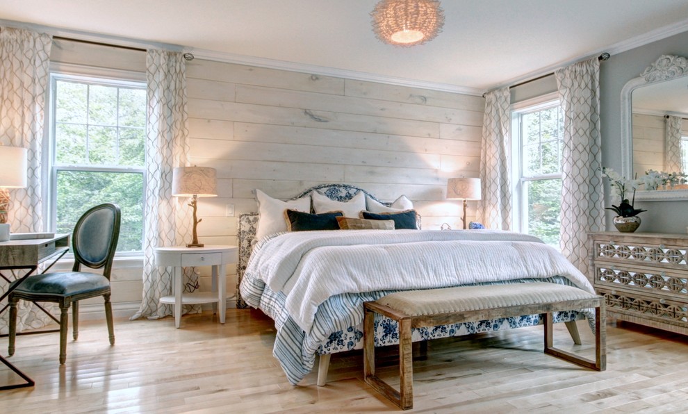 Design ideas for a large country master bedroom in Other with grey walls, light hardwood floors and beige floor.