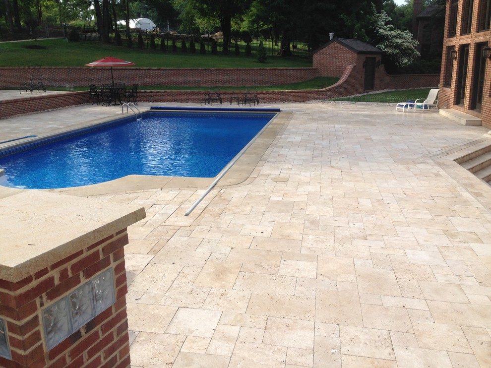 Pool - mid-sized traditional backyard tile and custom-shaped pool idea
