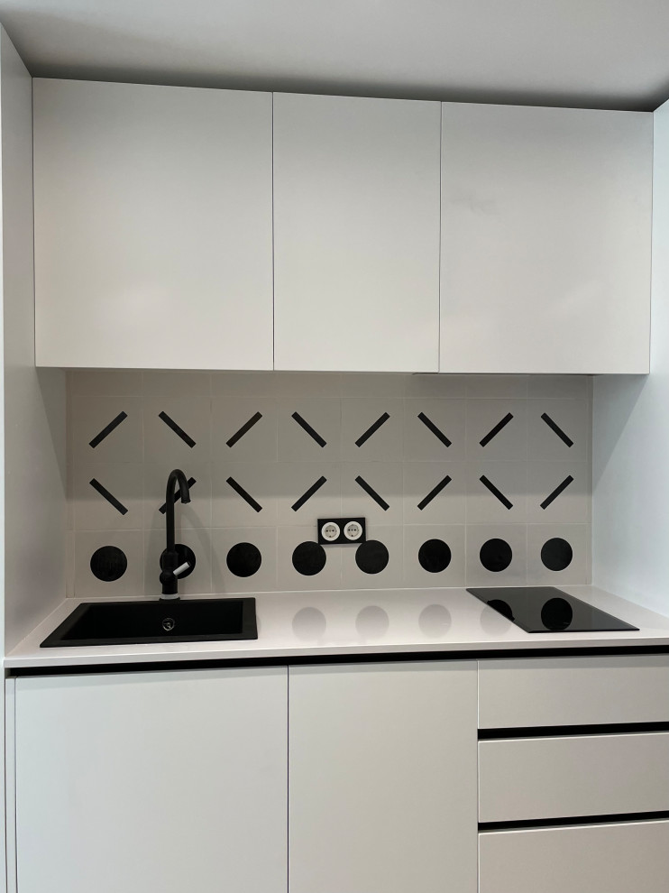 This is an example of a contemporary kitchen in Madrid.