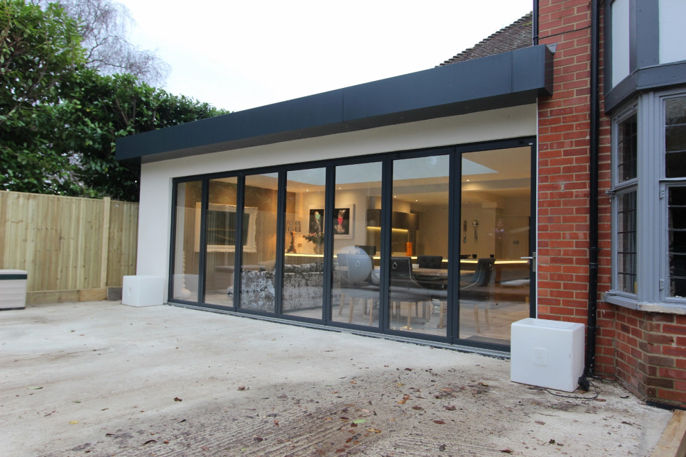 Contemporary kitchen orangery with solarlux bifold doors