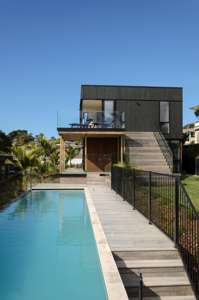 Mid-sized modern exterior in Auckland.