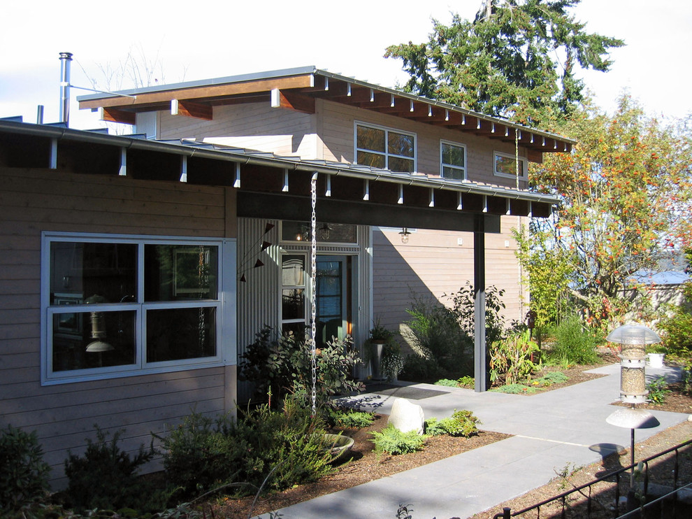 Inspiration for a contemporary exterior in Seattle with metal siding.